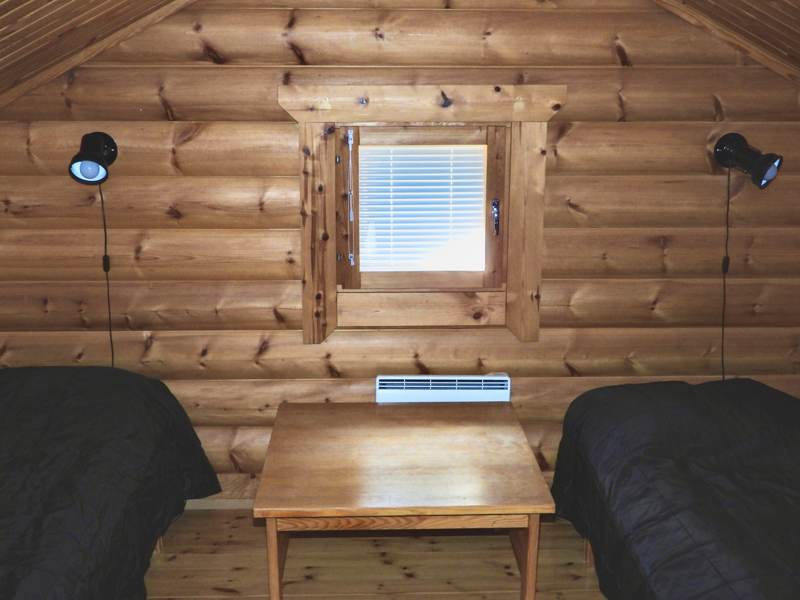 Sleeping area with two beds.